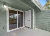 Thumbnail 63 of 66 - Cascade Woods patio with sliding glass door