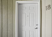 Thumbnail 9 of 44 - A white door with a black handle is set in a white frame.