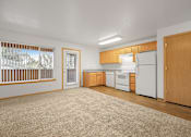 Thumbnail 5 of 18 - Zachary Park Apartments Living Room & Kitchen