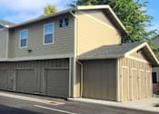 Thumbnail 44 of 46 - A row of houses with attached garages.