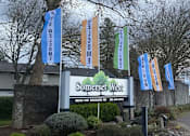 Thumbnail 1 of 64 - A sign for Somerset West stands in front of a house.