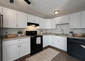 Thumbnail 12 of 17 - Parkview Apartments Kitchen