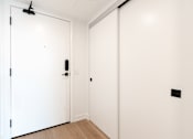 Thumbnail 30 of 81 - A white door with a black handle and a black latch.