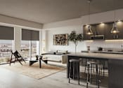 Thumbnail 8 of 11 - A modern kitchen with a bar area and a view of the city.