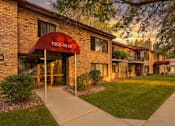 Thumbnail 1 of 59 - The image shows a building with a red awning that has the numbers 1002-1018 on it.
