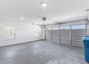 Thumbnail 3 of 16 - Omaha Wenninghoff Road Nebraska Apartment Rentals Redwood Living Redwood Omaha Wenninghoff Road Garage