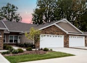 Thumbnail 3 of 11 - Altoona IA Apartment Rentals Redwood Altoona Exterior Two Car Garage
