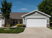 Thumbnail 2 of 8 - Brownstown MI Apartment Rentals Redwood Red Hawk Landing Two Car Garage