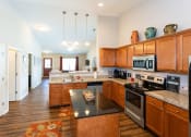 Thumbnail 4 of 10 - Dublin Ohio Apartment Rentals Redwood Dublin Kitchen to Living Room Redwood Living