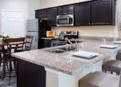 Thumbnail 3 of 6 - Grove City OH Apartment Rentals Redwood Grove City Kitchen