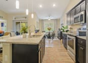 Thumbnail 2 of 10 - Holland Michigan Apartment Rentals Redwood Living Redwood Holland Willowood Kitchen