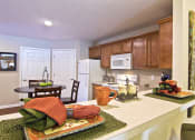 Thumbnail 4 of 9 - North Ridgeville OH Apartment Rentals Redwood North Ridgeville Bagley Road Kitchen