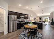 Thumbnail 4 of 13 - Batavia Township Ohio Apartment Rentals Redwood Living Redwood Batavia Townshipe Forestwood Kitchen to Den