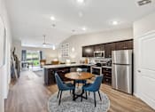 Thumbnail 5 of 14 - Miami Township Ohio Apartment Rentals Redwood Living Redwood Miami Township SR 28 Forestwood Kitchen to Den