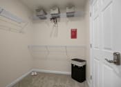Thumbnail 14 of 19 - A white closet with a red sign on the wall.