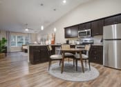 Thumbnail 5 of 10 - Waukee Iowa Apartment Rentals Redwood Living Redwood Waukee Hickman Road Breezewood Kitchen