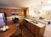 Thumbnail 2 of 9 - Westfield Indiana Apartment Rentals Redwood Westfield Myra Way Kitchen Granite