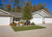 Thumbnail 1 of 10 - Wolverine Lake Michigan Apartment Rentals Redwood Wolverine Lake Exterior Front
