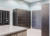 Thumbnail 14 of 33 - a room with lockers and a counter with a counter top
