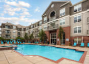 Thumbnail 8 of 25 - our apartments offer a swimming pool in front of our building