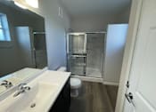 Thumbnail 5 of 6 - A bathroom with a white sink and a walk-in shower at Hamlet On The Bend, Hebrun, 41048