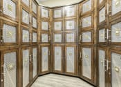 Thumbnail 35 of 63 - a room filled with wooden cabinets and lockers at Vanguard Crossing, St. Louis, MO 63124