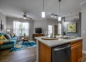 Thumbnail 16 of 51 - Kitchen And Living Area at Riachi at One21, Texas, 75025