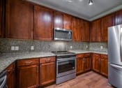 Thumbnail 21 of 51 - Efficient Appliances In Kitchen at Riachi at One21, Plano, Texas