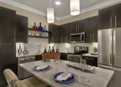 Thumbnail 39 of 52 - a kitchen with stainless steel appliances and a dining table at Aster Apartments, Ohio, 44122