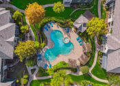 Thumbnail 42 of 51 - Aerial view of the Sparkling Swimming Pool at Riachi at One21, Plano, TX