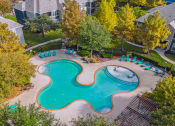 Thumbnail 2 of 51 - Swimming Pool aerial view And Relaxing Area at Riachi at One21, Plano, 75025