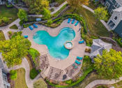 Thumbnail 40 of 51 - Overhead view of a swimming pool and a resort style pool at Riachi at One21, Plano, TX, Texas