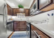 Thumbnail 1 of 32 - Efficient Appliances In Kitchen at Whisper Hollow Apartments, Maryland Heights