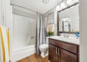 Thumbnail 5 of 32 - Bathroom With Bathtub at Whisper Hollow Apartments, Maryland Heights, Missouri