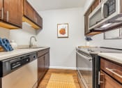 Thumbnail 8 of 32 - Fully Equipped Kitchen at Whisper Hollow Apartments, Maryland Heights
