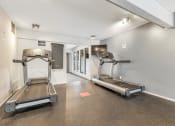 Thumbnail 21 of 32 - Cardio Equipment at Whisper Hollow Apartments, Maryland Heights, MO, 63043