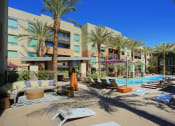 Thumbnail 18 of 48 - Poolside Relaxing Area at Audere Apartments, Phoenix, AZ, 85016