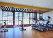 Thumbnail 25 of 48 - Cardio Machines In Gym at Audere Apartments, Phoenix, AZ, 85016
