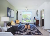 Thumbnail 29 of 48 - Living Room With TV at Audere Apartments, Phoenix
