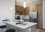Thumbnail 34 of 48 - Gourmet Kitchen With Islands at Audere Apartments, Phoenix, AZ