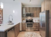 Thumbnail 5 of 48 - Fully Equipped Kitchen at Audere Apartments, Phoenix, AZ