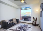 Thumbnail 37 of 48 - Living Room With Balcony at Audere Apartments, Arizona