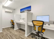 Thumbnail 10 of 28 - an office with a computer and a desk with a chair at Park 44, St. Louis, 63108