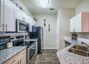 Thumbnail 5 of 20 - Granite Counter Tops In Kitchen at Parkside at South Tryon, Charlotte, North Carolina