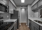 Thumbnail 16 of 44 - Fully Equipped Kitchen at Wellington at Willow Bend, Plano, TX, 75093