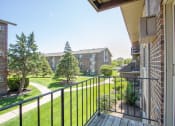 Thumbnail 27 of 37 - Balcony View of Green Courtyard at The Greenway at Carol Stream, Carol Stream, Illinois 60188