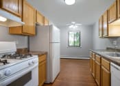 Thumbnail 1 of 19 - Kitchen with Dinette Space & Windows at Emerald Pointe Apartments, Vernon Hills, 60061