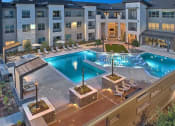 Thumbnail 1 of 40 - an aerial view of an apartment complex with a pool at Hunters Creek Apartments, Denton, TX 76210