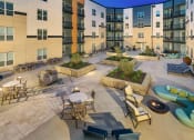 Thumbnail 27 of 52 - Outdoor Grill And Patio at Aster Apartments, Beachwood