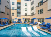 Thumbnail 17 of 52 - Pool With Sundecks at Aster Apartments, Beachwood, Ohio